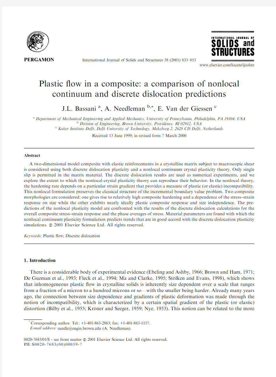 Plastic flow in a composite a comparison of nonlocal continuum and discrete dislocation predictions