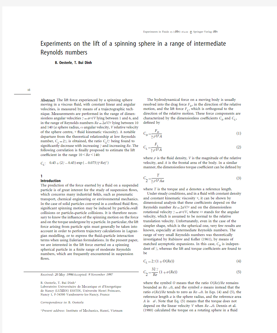 Experiments on the lift of a spinning sphere in a range of intermediate Reynolds numbers